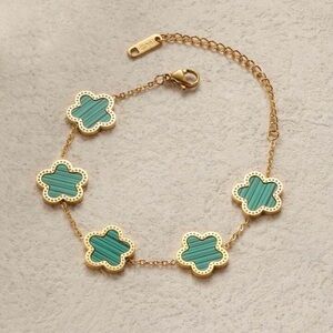 Elegant Gold Stainless Steel Bracelet with Green Floral Charms
